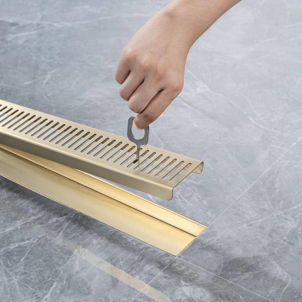 2.75 In. W X 28 In. D Stainless Steel Decorative Drain Cover With Brushed Gold